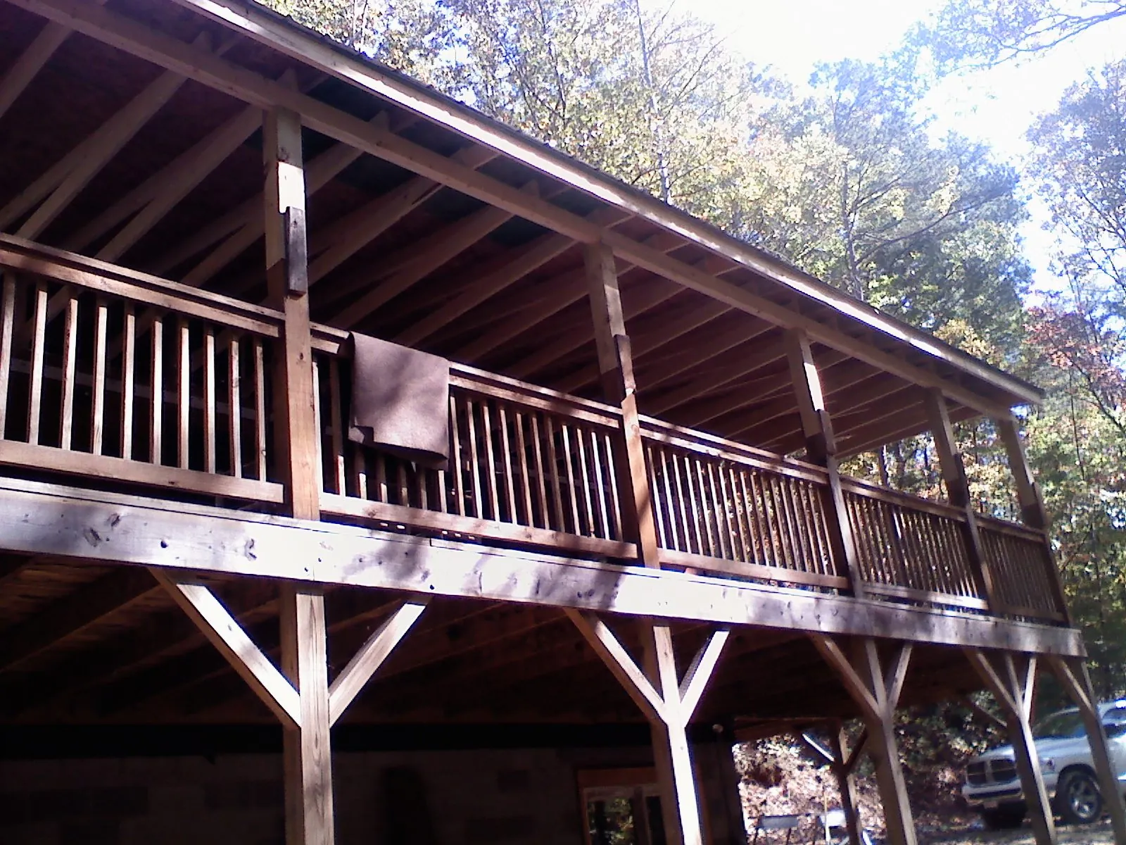 Timber framing under a new elevated porch and deck — Roof Leak Repair in Mineral Springs by Roofing Brothers